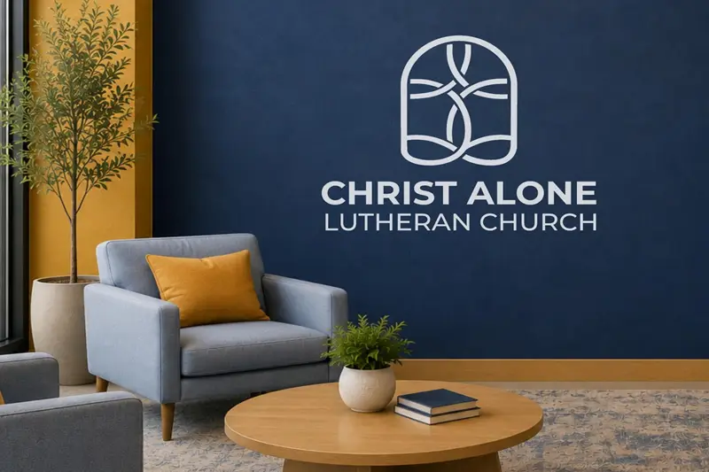 mockup of seating area in front of new logo on the wall